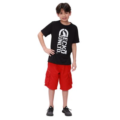 Pictured is a boy wearing a black "Ecko" Short Sleeve Vertical Rhino Tee with the logo in white. This is paired with red cargo shorts and black athletic shoes.