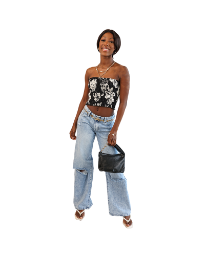 The women's junior model wears the black and white 