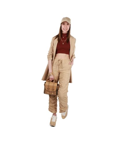 The female junior model wears the cabernet "FCT" Sleeveless Mock Neck Crop Top, khaki "Full Circle" Parachute Pants, and beige "EMAS" Pleather Printed Sneakers.