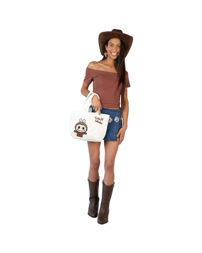 The women's junior model wears the brown 