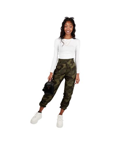 The female junior model wears our white "Bozzolo" Long Sleeve Crop Top, "AF" Skinny Pull-on Camo Cargo Pants, and white "Top" Platform Athletic Sneakers.