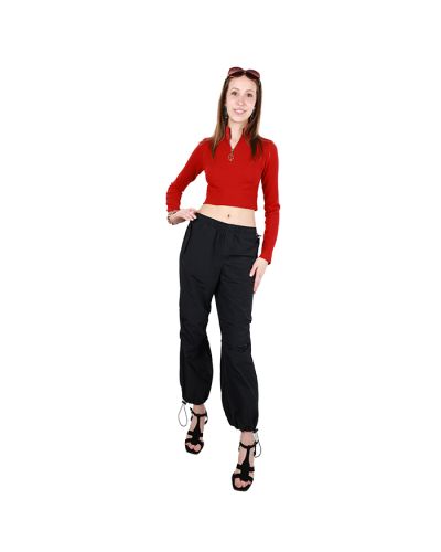 The female junior model wears our red "CTTN" 15" Long Sleeve O-Ring Quarter Zip Crop Top, black "Ikeddi" 11" Parachute Pants, and black "Forever" 4" Cage Open Toe Heeled Dress Sandals.