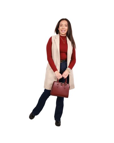 The female contemporary model wears an oatmeal-colored "Love Tree" Sleeveless Wool Open Jacket, a cabernet "Full Circle" Long Sleeve Mock Neck Top, "Hers" 1-button Wide Flare Dark Wash Denim Jeans, and black "Forever" 2" Lug Elastic Sides Pleather Booties