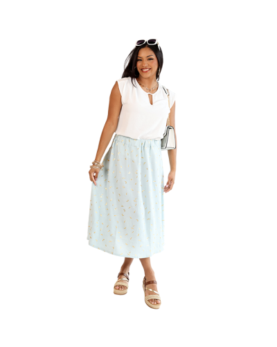 The women's contemporary model wears the white 
