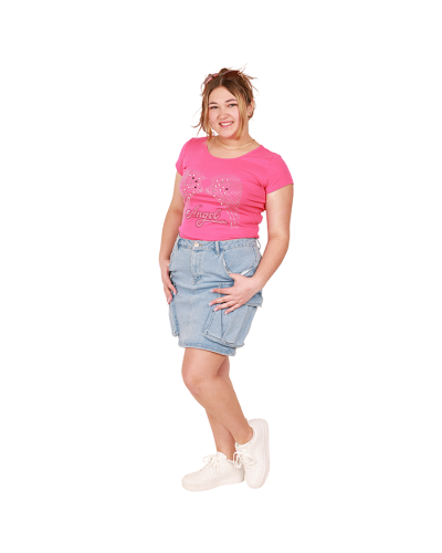 The women's plus size model wears the pink 