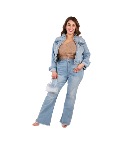 The female plus model wears the "Wax" Distressed Denim Jacket, "Zenobia" Rhinestone Corset Top, "Wax" 12.5" Light Wash 1-Button Distressed Fray Hem Denim Jeans, and the "Forever Link" 3" Clear Heels.
