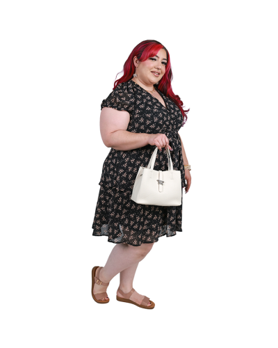 The women's plus-size model wears the black 
