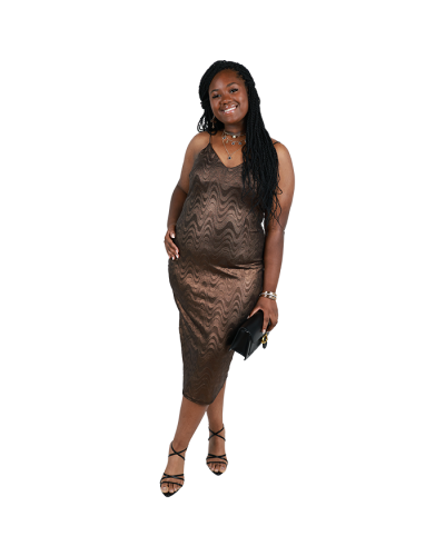 The women's plus-size model wears the bronze metallic 