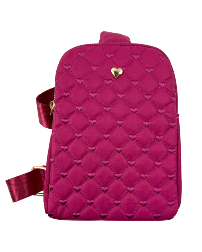 The fuschia "Emperia" Heart Emblem Sling Backpack is pictured here.