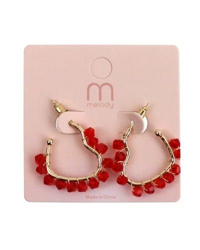 The red "Odin" Crystal Wrapped Heart Hoop Earrings are pictured here.