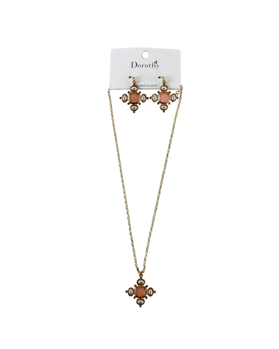 The blush "Oz" Pearlized Cross Earring and Necklace Set is pictured here.