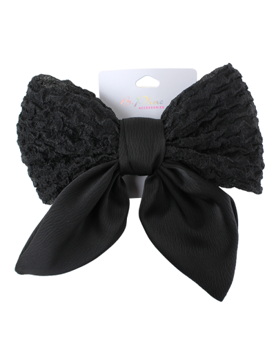 The black "B PHNE" Black Ruche Bow Hair Clip is pictured here.