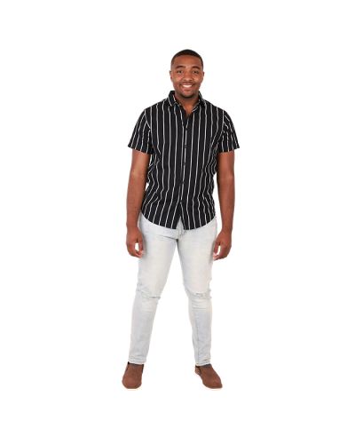 The male model wears the "Denim" Short Sleeve Black & White Striped Button-Down Shirt, "Aero" Light Wash Denim Skinny Jeans, and brown "Marco" Slip-on Loafers.