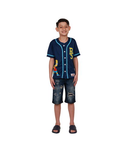 The boy model wears the "Freeze" Bart Simpson Short Sleeve Button Down Baseball Tee, "True Indigo" Distressed Denim Shorts, and the "Bon Bini" Navy EVA Sandals.