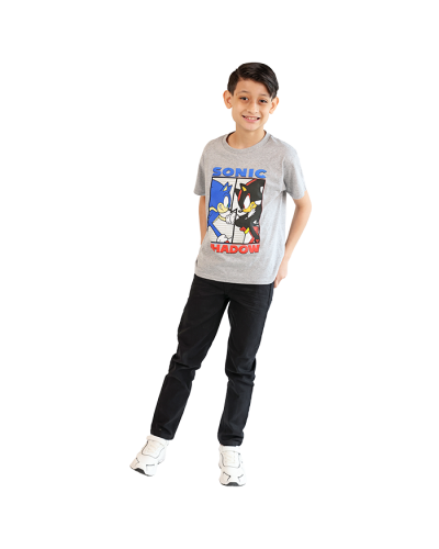 The boy model wears the grey "Sonic" Short Sleeve Sonic + Shadow Graphic Tee, "True Indigo" Black Denim Jeans, and the white "Air" Pleather Lace-Tie and Velcro Athletic Shoes.