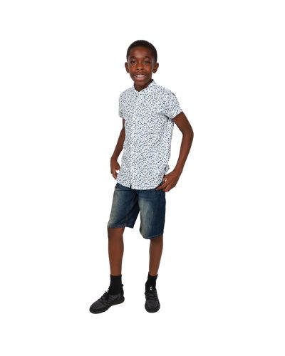 The boy pictured wears our white with blue and yellow floral "Fashion Business Corp" Short Sleeve Button Down Floral Top, dark wash "True Indigo" Denim Jean Shorts, and the black and grey "Air" Jogger Lace Up Athletic Shoes.
