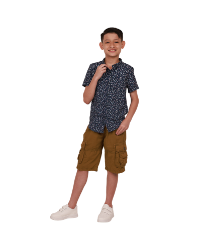 The boy model wears the "Denim" short-sleeve navy white floral print dress shirt, "Raw" twill cargo pocket shorts, and the "Air" 2-velcro athletic sneakers. 