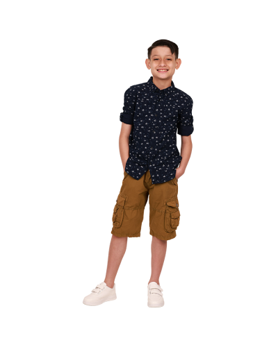 The boy model wears the"Cactus" Short-Sleeve Navy White Grey Floral-Print Dress Shirt, "Raw" Twill Cargo Pocket Shorts, and "Air" 2-Velcro athletic sneakers.