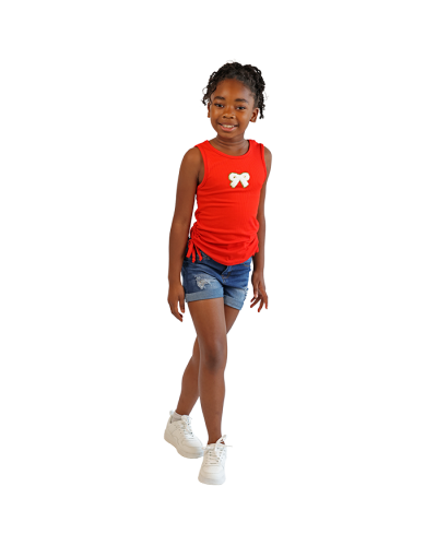 The girl model wears the red bow "Dream Girl" Sleeveless Ruched Side 3-D Emboss Tank Top, "Denim Diva" Dark Wash 1-Button Distressed Roll Cuff Denim Jean Shorts, and the white "Forever" Solid Color Pleather Athletic Shoes.