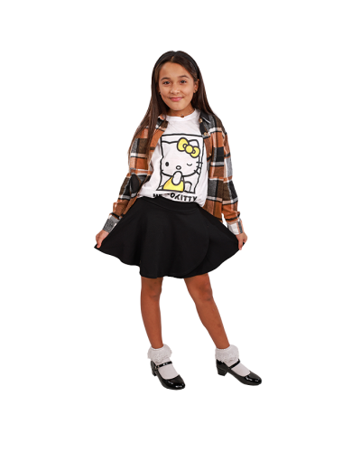 The girl model wears our pop culture "Wonderland Toys" Hello Kitty Graphic Tee with the "Ikeddi" Long Sleeve Oversized Plaid Shacket, black "Chocolate" Wave Skirt, and black "Lucky" 1" Ballerina Mary Jane Heeled Dress Shoes.