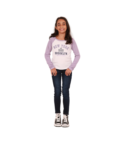 The girl model wears the purple and white "No Comment" Long Sleeve Raglan Screen Print Baby Tee, "Hailey" Dark Wash Denim Skinny Jeans, and the black "Lucky" High Top Platform Canvas Sneakers.