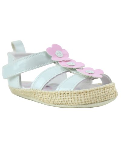 The "First" White Strappy Velcro Pink Flower Espadrille Sandals are pictured here.