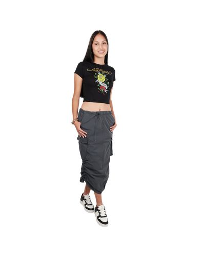 The female junior model wears the "Ed Hardy" Short Sleeve Black Rose Heart Tattoo Crop Top featured with our grey "Love Tree" Parachute Skirt and black and white "Forever" Pleather Multi-Colored Sneakers.