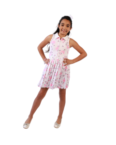 Girl wearing pink floral dress with ballet flats