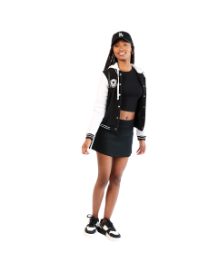 The women's junior model wears the black and white 