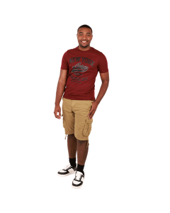 The male model wears the burgundy "Aero" Short Sleeve New York Athletic Div. Graphic Tee, khaki "Raw X" Cargo Pocket Belted Shorts, and black and white "Forever" Low Top Pleather Lace-up Sneakers.