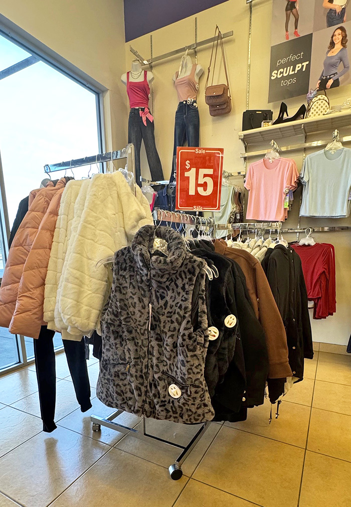 Pictured here is a Red Hot Sale rack with $15 faux fur and puffer jakcets