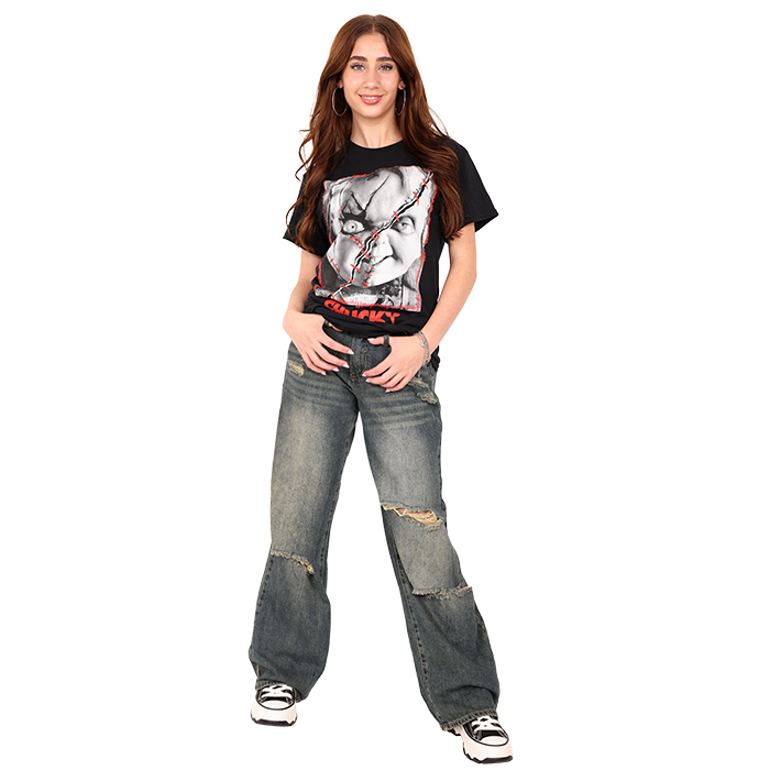 Get ready to embrace the spooky season with our featured "Freeze" Chucky Short Sleeve Graphic Tee shirt. Whether you're drawn to the edgy grunge aesthetic with broad-leg jeans, a distressed denim jacket, and combat boots, or you lean towards a more polished, pleather girly style with a fitted skirt, ankle boots, and statement accessories, we have two complete looks tailored to match your unique fashion personality. These outfits are designed to help you express your love for the iconic Chucky character while staying true to your style.