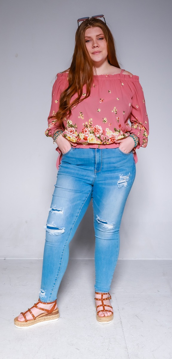 Pink cold shoulder floral top with light wash distressed jeans