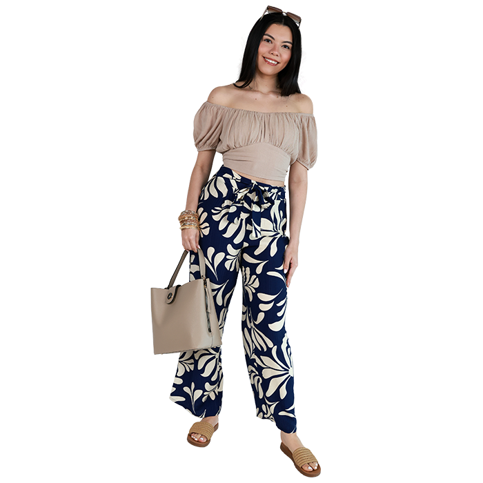 Is it time for a vacation yet? Embrace the spirit of relaxation and adventure with the stylish "Ambiance" Short Sleeve Gauze Tie Back Crop Top, featuring a lightweight, breezy fabric that keeps you cool on warm days. Pair it with the vibrant "Smiles" Printed Navy and White Rayon Tropical Printed Wide Leg Pants, designed with a playful tropical design that adds a fun flair to your ensemble. Finish off your look with the chic "Forever" Woven Crochet Slip-on Flat Sandals, crafted for comfort and ease, making them perfect for strolling along sandy beaches or exploring new destinations.