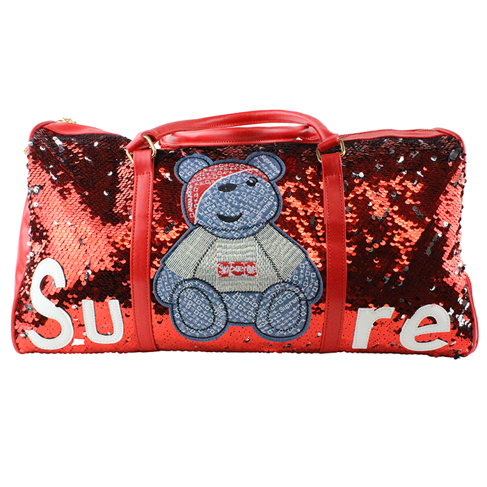 Travel boldly with our statement piece, the "Pink" Bear Sequin Duffle Bag. You'll grab attention anywhere you go with your travel fashion accessory.