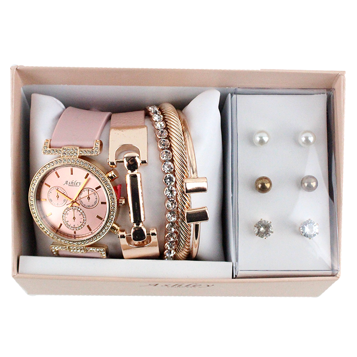 Introducing the perfect accessory to elevate the sophisticated young woman's style: the "Royal" Pink Rhinestone Watch, Bracelet, and Earrings Boxed Set. This versatile piece is ideal for enhancing your work look, making it an excellent addition to any professional wardrobe. Whether you're dressing for the office or selecting a thoughtful gift, the "Royal" Pink Rhinestone Watch, Bracelet, and Earrings Boxed Set embodies elegance and modernity. Its design blends seamlessly with various outfits, ensuring that the wearer stands out in any setting. Give the gift of sophistication or treat yourself to this must-have accessory set. 
