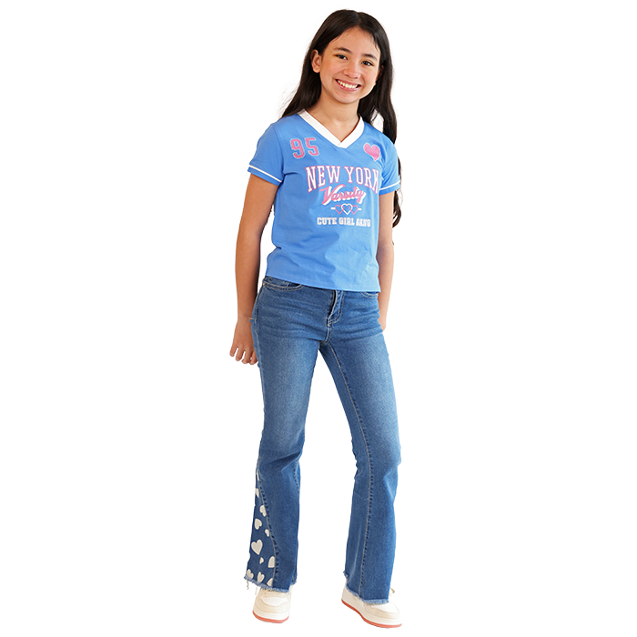Get your little girl ready for the back-to-school season with a stylish and comfortable outfit that she'll love. Start her look with the “V & R” Short Sleeve Screen Print Varsity Tee. This trendy tee features vibrant graphics and a classic varsity style, making it a fun addition to any girl’s wardrobe for school. Next, pair the tee with the “Denim Diva” Wide Leg Acid Wash 1-Button Denim Jeans. These fashionable jeans offer a relaxed, wide-leg fit that’s perfect for active school days. The eye-catching acid wash finish adds a modern twist, while the convenient 1-button design makes getting dressed a breeze.  Complete the outfit with the “Forever” Solid Color Pleather Athletic Shoes. These versatile shoes provide excellent support and comfort, making them ideal for all-day wear, whether she's playing on the playground or walking to class. The durable pleather material is easy to clean and maintain while enhancing her overall stylish look. This back to school outfit is not only fashionable but also functional, ensuring that your little girl feels confident and ready to take on the school year with ease.
