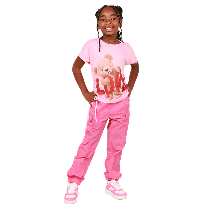 Pink is the standout color with our "Davida" Short Sleeve Side Tie 'Love' Bear Graphic Tee. This tee features a cute bear graphic and a stylish side tie detail. Pair it with our "Lorency" Parachute Double Cargo Pocket Jogger Pants for a comfortable and trendy look. The pants come with convenient cargo pockets for added utility. Complete your outfit with our "Forever" Pleather Lace-up Multicolored Athletic Sneakers, which combine style and functionality for a colorful and sporty touch.