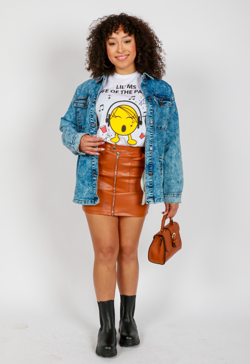 Sydney Cooper's look for My Melrose: "Miss Popular" Short Sleeve Lil' Ms Life of the Party, paired with the, "Diamante" Long Acid Wash Denim Jacket, "Chocolate" 15" Cognac Full Zip Pleather Skirt, and "Wild" Lug Pleather Elastic 6 1/2" Booties