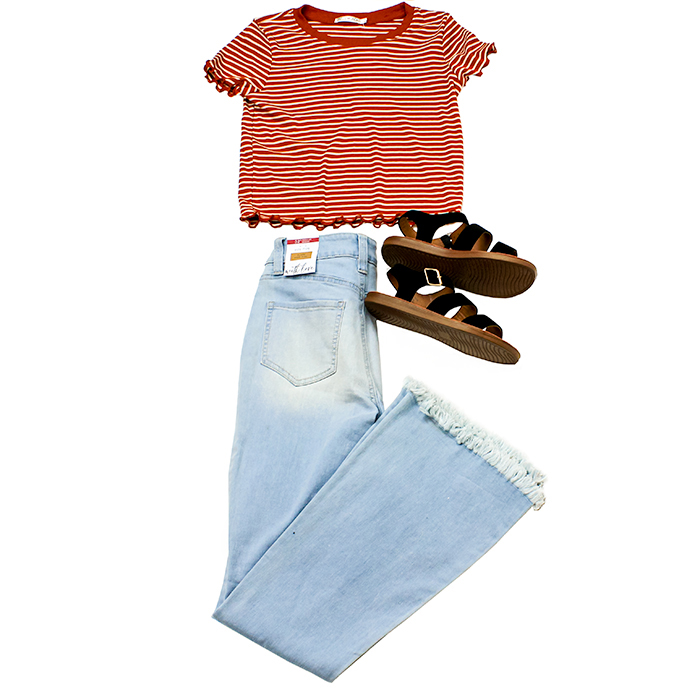 Pictured above is a My Melrose style by Sydney Cooper. The outfit layout features the Heart & Hips Short Sleeve Crop Stripe Marrow Top, YMI flare jeans and black strap sandals.