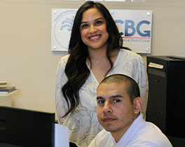 Image of two smiling Melrose corporate office workers