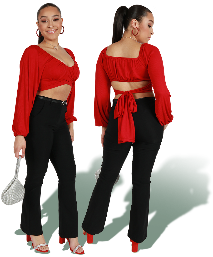 Two images of model showcasing crop and slacks style